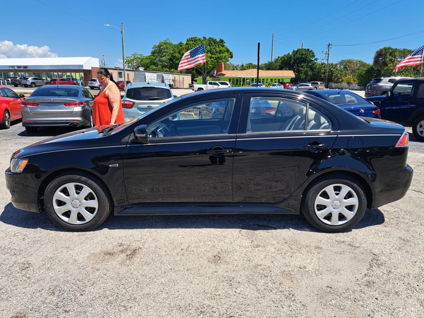 2015 Black Mitsubishi Lancer ES CVT (JA32U2FU1FU) with an 2.0L L4 SOHC 16V engine, Continuously Variable Transmission transmission, located at 1181 Aurora Rd, Melbourne, FL, 32935, (321) 241-1100, 28.132914, -80.639175 - Photo#0